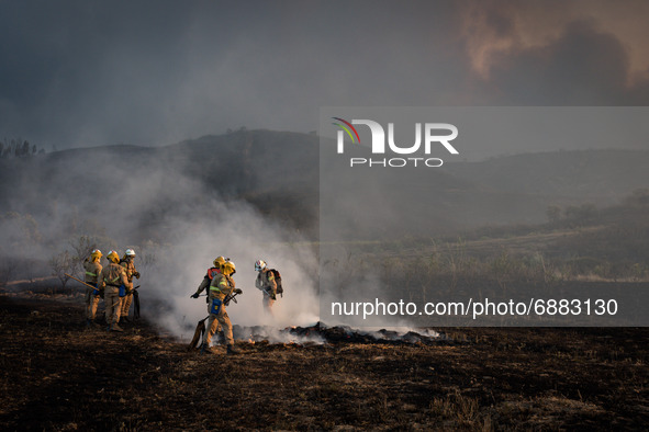 Forest fire in the area of Monchique and Portimao. Firefighters are trying to contain this big fire in the Algarve area and some people has...