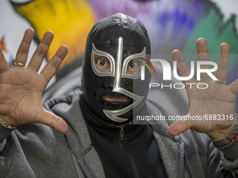 Wrestling legend 'El Rayo de Jalisco' poses for photos during an autograph signing to fans  as part of his promotion event at Psy'kaza Decor...