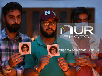 Kashmiri Journalists pay homage to a journalist Danish Siddiqui who was killed in Afghanistan during clashes between Afghan forces and Talib...