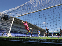  Oldham Athletic's Hallam Hope scores his sides first goal of the game during the pre season friendly match between Oldham Athletic and Wiga...