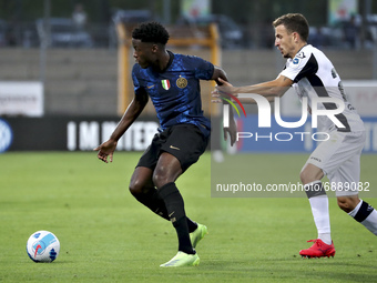 Lucien Agoume' of FC Internazionale in action during the Pre-Season Friendly match between Lugano and FC Internazionale at Cornaredo Stadium...