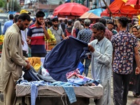 People purchase goods ahead of Muslim festival Eid-Ul-Adha in Sopore town of District Baramulla Jammu and Kashmir India on 20 July 2021. (
