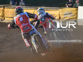  Bjarne Pedersen  (Red) chases Dan Bewley  (White) during the SGB Premiership match between Peterborough and Belle Vue Aces at East of Engla...