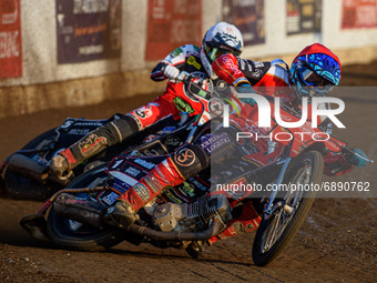  Ulrich Ostergaard  (Red) leads Dan Bewley  (White) during the SGB Premiership match between Peterborough and Belle Vue Aces at East of Engl...