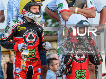 (rear) Belle Vue BikeRight Aces  CEO Adrian Smith (left) and Team Manager Mark Lemon watch on with (front) Dan Bewley  (left) and Brady Kurt...