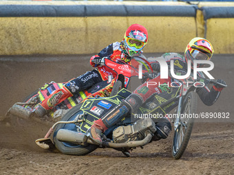  Jye Etheridge  (Yellow) leads Michael Palm-Toft  (Red) during the SGB Premiership match between Peterborough and Belle Vue Aces at East of...