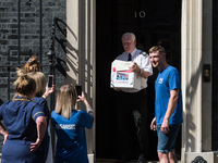 LONDON, UNITED KINGDOM - JULY 20, 2021: NHS staff deliver a petition with 800,000 signatures to 10 Downing Street demanding 15% pay increase...