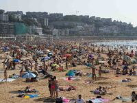 View of La Concha beach in San Sebastian crowded of people, on July 20, 2021. Beachgoers have gathered at the beaches on San Sebastian, Spai...