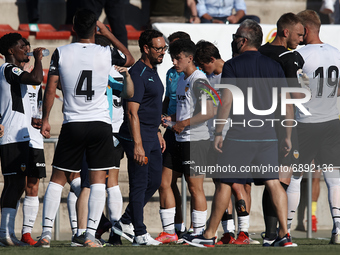 Jose Bordalas head coach of Valencia gives instructions to his players during the Pre-Season friendly match between Valencia CF and Villarre...