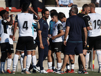 Jose Bordalas head coach of Valencia gives instructions to his players during the Pre-Season friendly match between Valencia CF and Villarre...