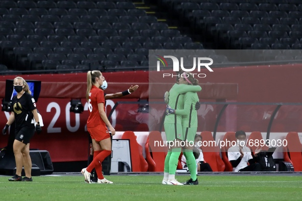 (1) Stephanie Labbe of Team Canada is embraced by teammate (18) Kailen Sheridan as she is substitutedduring the Women's First Round Group E...