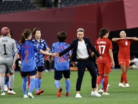 Head Coach PRIESTMAN Bev of Canada team handshake with (2)SHIMIZU Risa of Team Japan after finished the Women's First Round Group E match be...