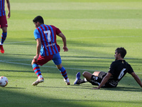 Yusuf Demir and Ribelles during the friendly match between FC Barcelona and Club Gimnastic de Tarragona, played at the Johan Cruyff Stadium...