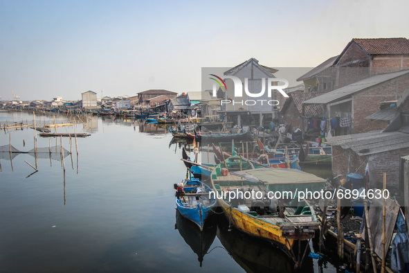 A number of fishing boats rest on a fishing village in Tambaklorok, Semarang, Central Java Province, Indonesia on July 21, 2021. 