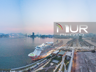The Genting Dream cruise ship is moored at the Kai Tak Cruise terminal in this panorama by drone in Hong Kong, China, 23 Jul 2021. Hong Kong...