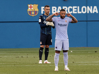 Memphis Depay of Barcelona celebrates after scoring his sides first goal during the pre-season friendly match between FC Barcelona and Giron...