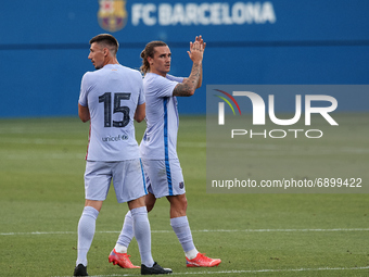 Antoine Griezmann and Clement Lenglet of Barcelona during the pre-season friendly match between FC Barcelona and Girona FC at Estadi Johan C...