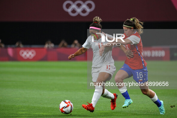(11) Desiree SCOTT of Team Canada battles for possession with (16) Rosario BALMACEDA of Team Chile during the Women's First Round Group E ma...