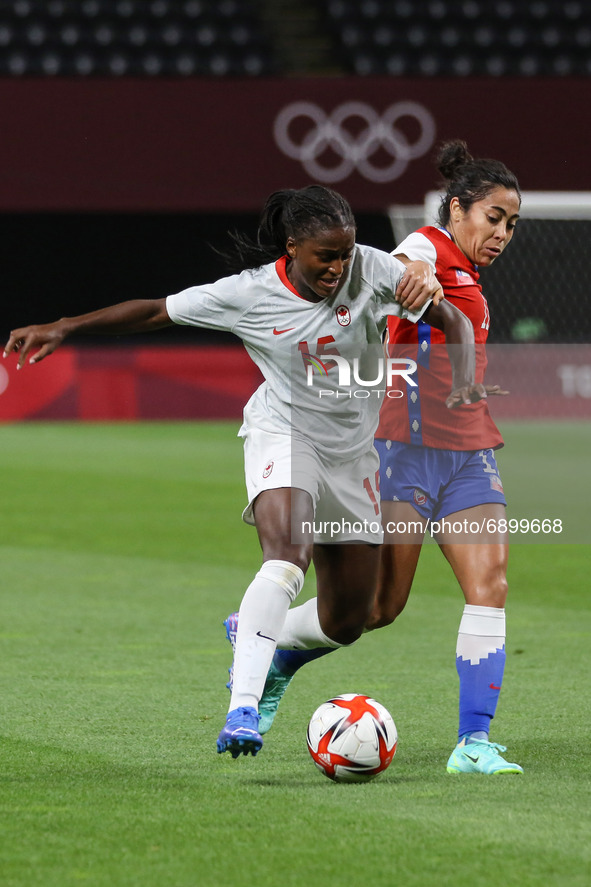 (15) Nichelle PRINCE of Team Canada battles for possession with (11) Yessenia LOPEZ of Team Chile during the Women's First Round Group E mat...