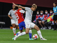 (5) QUINN of Team Canada battles for possession with (8) Karen ARAYA of Team Chile during the Women's First Round Group E match between Chil...