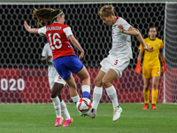 (5) QUINN of Team Canada battles for possession with (16) Rosario BALMACEDA of Team Chile during the Women's First Round Group E match betwe...