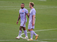 Memphis Depay and Frenkie De Jong during the friendly match between FC Barcelona and Girona FC, played at the Johan Cruyff Stadium on 24th J...