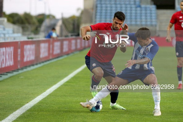 Zeki Celik of Lille OSC (L) vies with Otavio of FC Porto during the pre-season friendly football match between FC Porto and Lille OSC at the...