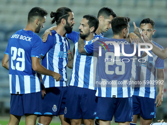 Bruno Costa of FC Porto (C ) celebrates with teammates after scoring during the pre-season friendly football match between FC Porto and Lill...