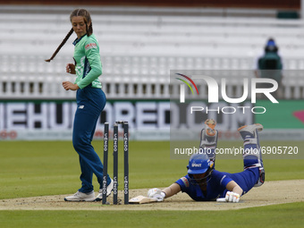 LONDON, ENGLAND - July 25:Deepit Sharma  of London Spirit Women gets run out by Joanne Gardner of Oval Invincibles Women during The Hundred...