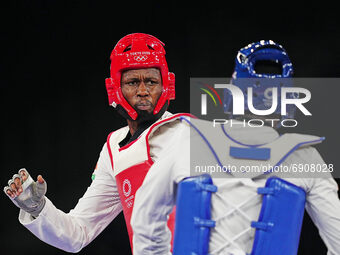 Alfag Issoufou from Nigeria and Seydou Gbane from Ivory Coast during Taekwondo at the Olympics at Makuhari Messe Hall A, Tokyo, Japan on Jul...