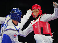Hongyi Sun from China and Ivan Sapina from Croatia during Taekwondo at the Olympics at Makuhari Messe Hall A, Tokyo, Japan on July 27, 2021....