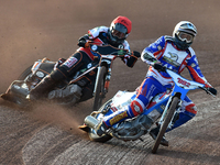 Jake Knight of Eastbourne Seagulls in the first turn with Jack Smith (Guest) of Belle Vue Cool Running Colts during the National Development...