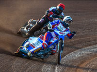 Jake Knight  (White) leads Jack Smith  (Red) during the National Development League match between Belle Vue Colts and Eastbourne Seagulls at...