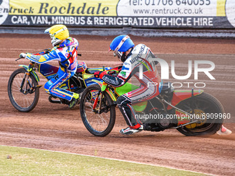 Ben Woodhull  (Blue) chases Nathan Ablitt  (Yellow) during the National Development League match between Belle Vue Colts and Eastbourne Seag...