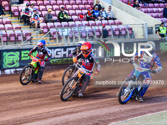 Jake Knight  (White) inside Connor Coles  (Red) with Ben Woodhull  (Blue) and Connor King  (Yellow) behind during the National Development L...
