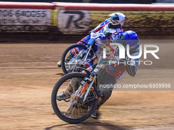 Jack Smith  (Blue) passes Jake Knight  (White) during the National Development League match between Belle Vue Colts and Eastbourne Seagulls...
