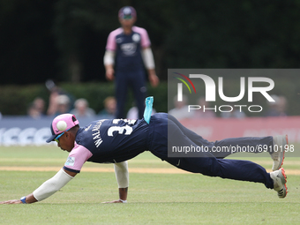 Thilan Walallawtia of Middlesex attempts to field the ball during the Royal London One Day Cup match between Middlesex County Cricket Club a...