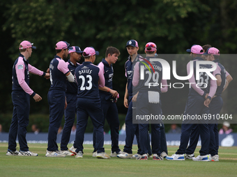Middlesex players gather after taking a wicket during the Royal London One Day Cup match between Middlesex County Cricket Club and Durham Co...