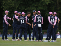 Middlesex players gather after taking a wicket during the Royal London One Day Cup match between Middlesex County Cricket Club and Durham Co...
