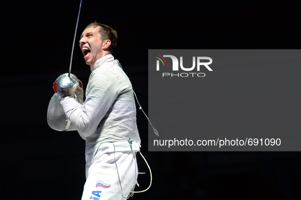 (150715) -- MOSCOW, July 15, 2015 () -- Alexey Yakimenko of Russia reacts after beating Daryl Homer of United States during men's sabre fina...