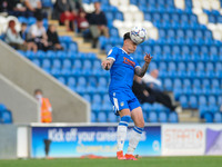 Colchesters Cameron Coxe heads the ball during the Pre-season Friendly match between Colchester United and Ipswich Town at the Weston Homes...