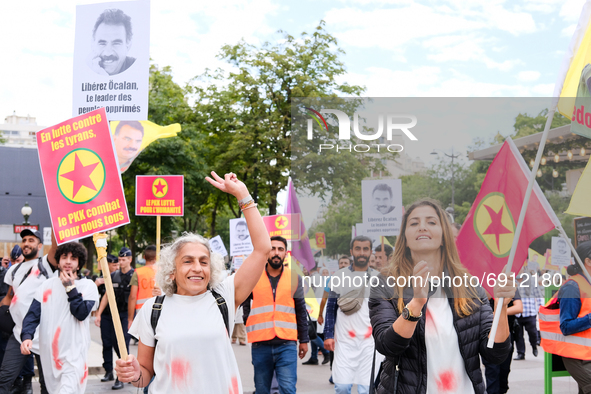 Kurdish demonstrators wear bloodstained clothing to remind the PKK martyrs who fought against Daesh  in Paris, France, on July 28, 2021. Kur...