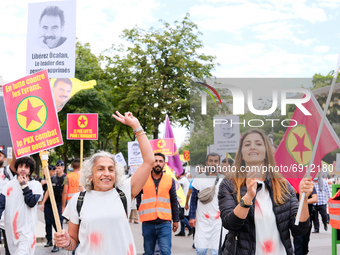 Kurdish demonstrators wear bloodstained clothing to remind the PKK martyrs who fought against Daesh  in Paris, France, on July 28, 2021. Kur...