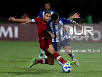 Lorenzo Pellegrini of AS Roma (L) fights for the ball with Otavio of FC Porto during an international club friendly football match between A...