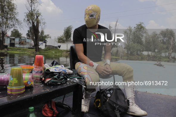 Gran Felipe Jr., a professional wrestler, aboard a boat before a wrestling event where he goes head to head with other gladiators in a ring...