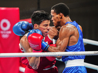 Daniel Francisco Veron from Argentina and Euri Cedeno Martinez from the Dominican Republic during pre final boxing knock out rounds at Kokug...