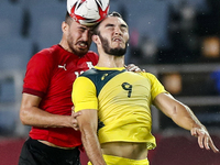 (18) Mahmoud EL WENCH of Team Egypt is challenged by (9) Nicholas D'AGOSTINO of Team Australia during the Men's Group C match between Austra...