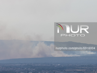 29/07/2021 Cuggioni, Oristano  Italy.
 The wildfires not yet completely extinguished create small fires visible from the surrounding hills....
