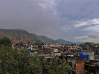 A view of walled city as clouds hover over it on a rainy day during the monsoon season in Jaipur, Rajasthan, India, Saturday, July 31, 2021....