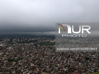 A view from Nahargarh hills as clouds hover over the city on a rainy day during the monsoon season in Jaipur, Rajasthan, India, Saturday, Ju...